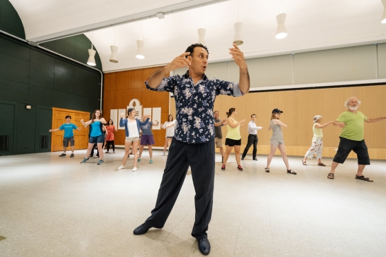 Andrés Bravo leads a tango class at the 250th Summer Celebration