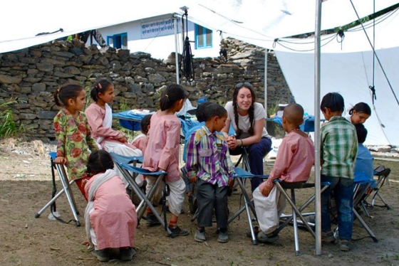 Sydney Kamen leading a handwashing workshop with a group of children