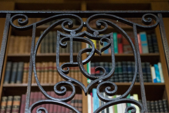 A detail of ironwork with a &quot;D&quot; and a &quot;C&quot;