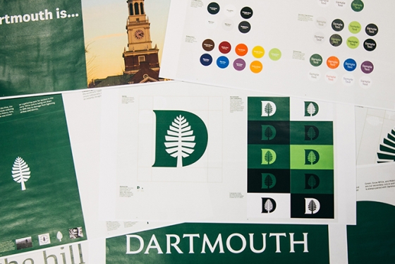 a pile of papers with Dartmouth's new logo on them
