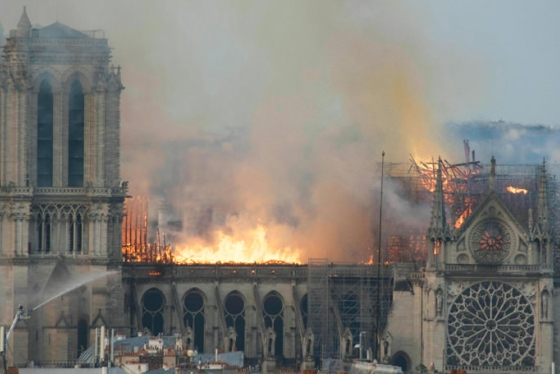 Flames rise from Notre Dame cathedral as it burns on Monday, April 15.