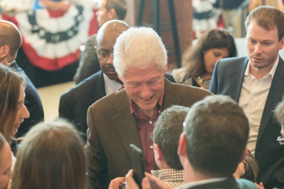 Bill Clinton signs autographs