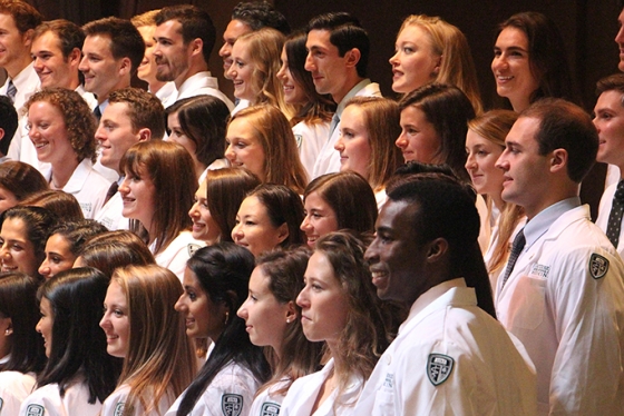 medical students in white lab coats
