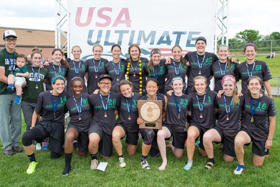the women's ultimate frisbee team posing together in their uniforms