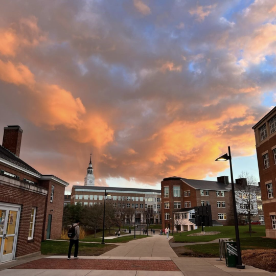 Dartmouth campus at sunset with orange and blue sky