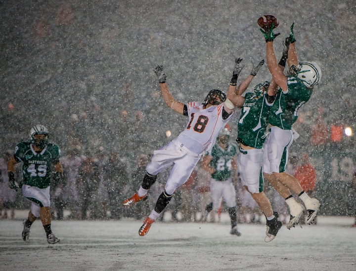 Free safety Garrett Waggoner '13 (#11) intercepts a Princeton pass during a snow storm.