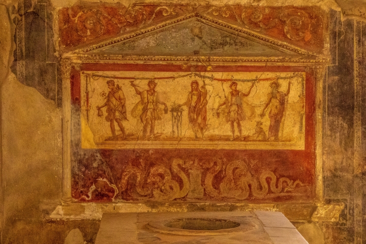 An ancient Roman Thermopolium and mural in Pompeii