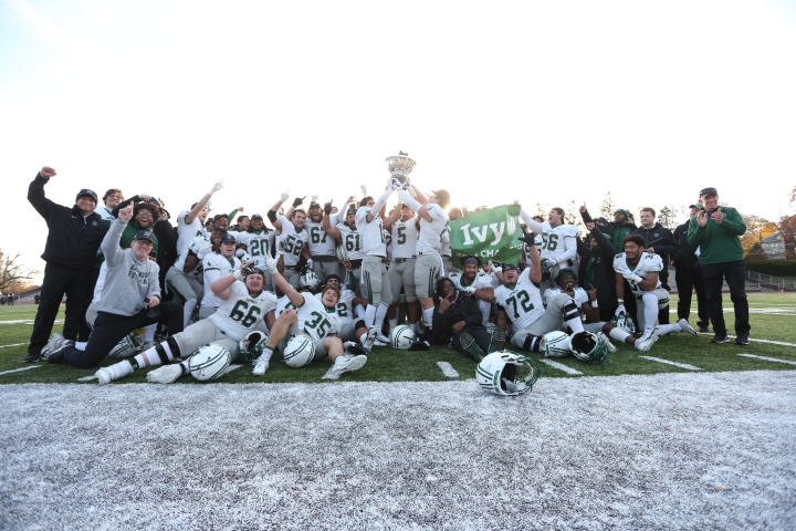 Football team holding up trophy