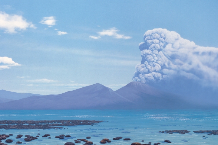 Water, mountains, and erupting volcano