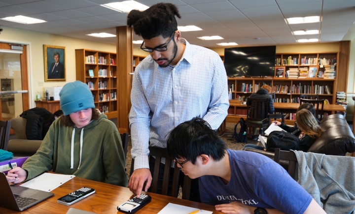 Jordan Ferreras working with students