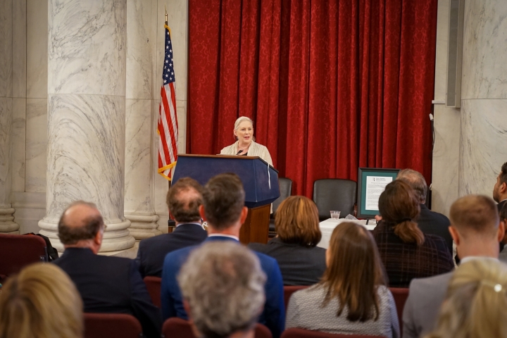 Senator Gillibrand speaking from the podium