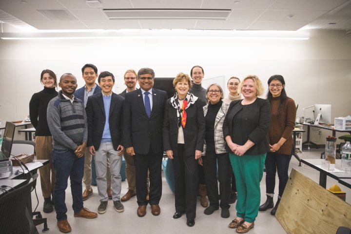 Jeanne Shaheen with a group of Dartmouth faculty and students