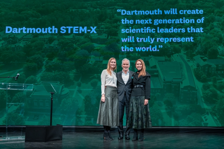 Coulters pose on stage at Dartmouth event