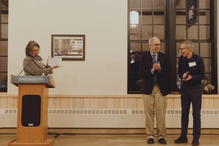 Ralph Gibson presented with a plaque honoring his 50 years of service to Dartmouth