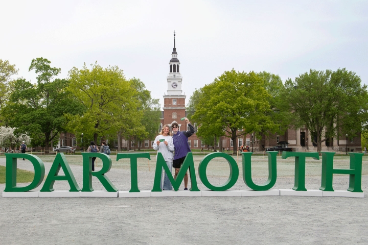 Dartmouth written in green letters with Baker-Berry in background