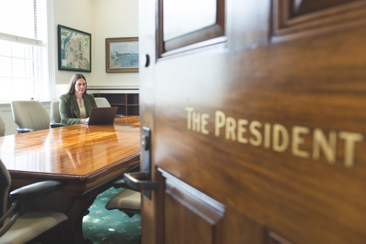 Sian Leah Beilock at her computer in the President's office