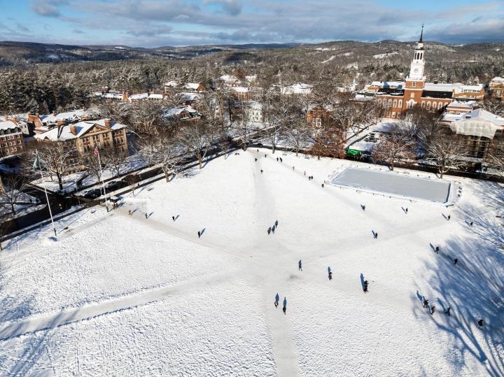 Aerial view of snowy Green and Baker Library.