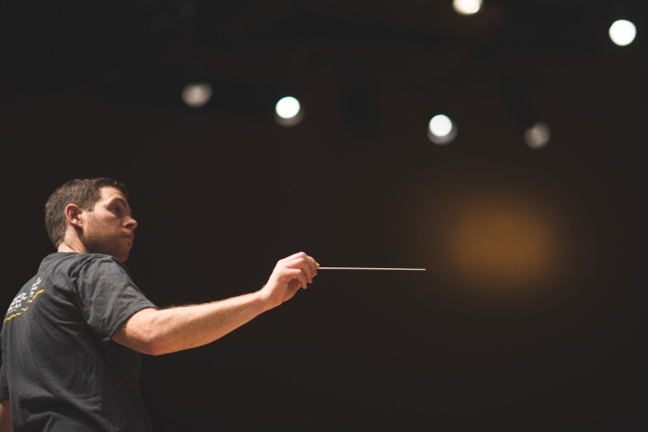 Brian Messier pointing a conductors wand