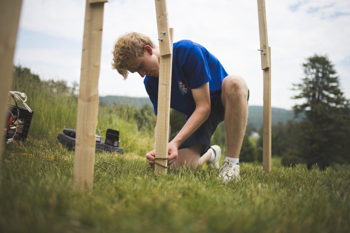 Alden Wilcox installing his ‘Pine Cone Pavilion’