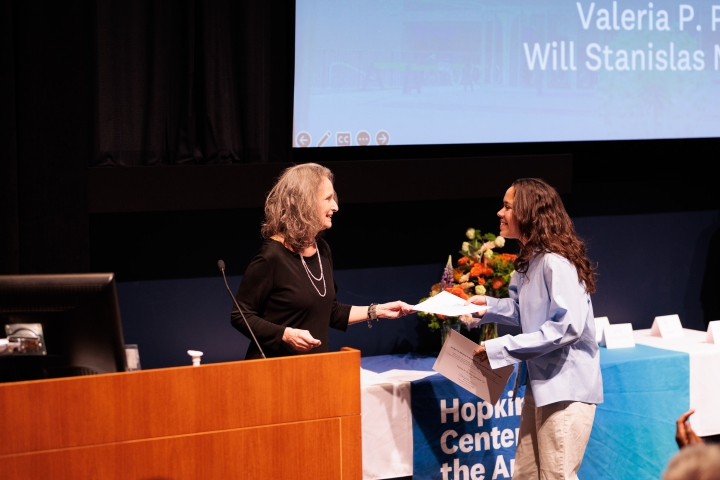 Mary Lou Aleskie presenting Valeria Pereira Quintero with her share of the Sudler Prize