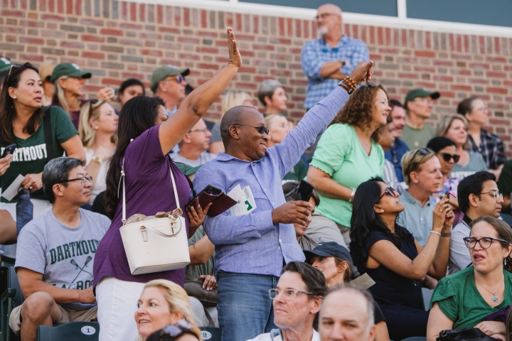 Parents waving to students