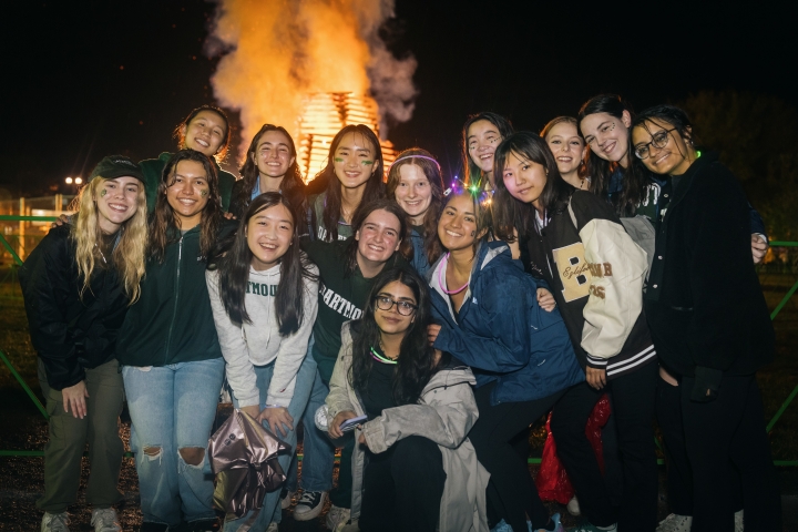 Group of women in front of the bonfire