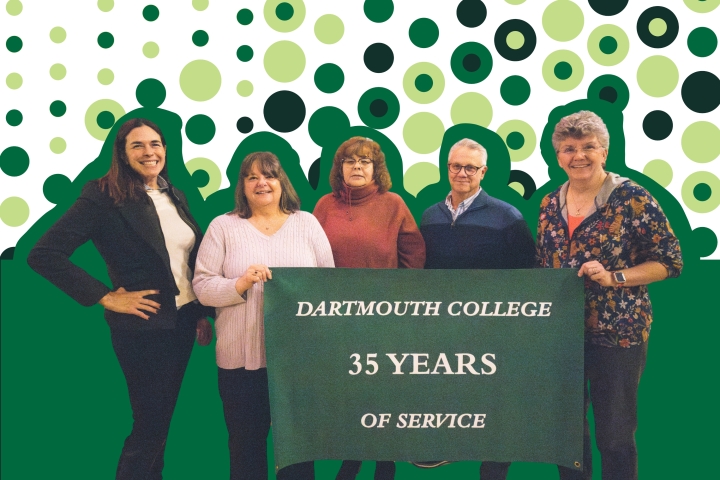 A group of Dartmouth College employees celebrating 35 years of service stand and smile