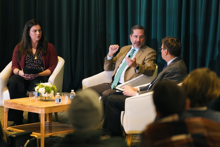 Alex Azar II sitting with Carrie Colla and Charles Wheelan