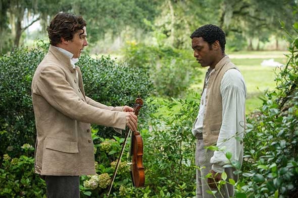 Actors Benedict Cumberbatch and Chiwetel Ejiofor in the movie 12 Years a Slave.
