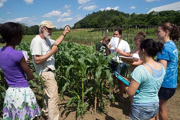 Scott Stokoe with students at the Organic Farm.