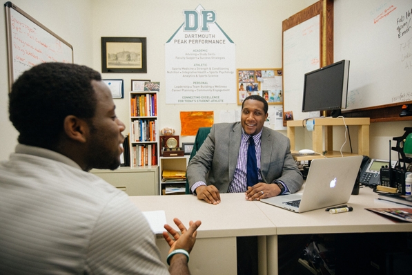 Donald Brooks, Dartmouth’s assistant director for athletics for peak performance, talks with student-athlete Matthew Shearin ’19.