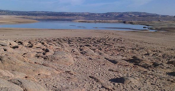 Folsom Lake Reservoir, one of California's most popular recreation areas, shows the effect of the drought in this 2014 image. (USGS Image by David Pratt)