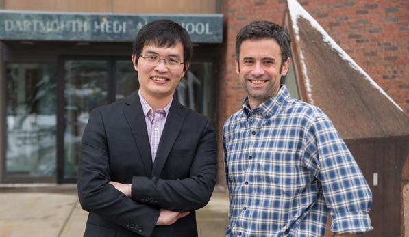 Biochemist Lin Deng, Geisel ’15, with his thesis adviser, James Mosely,