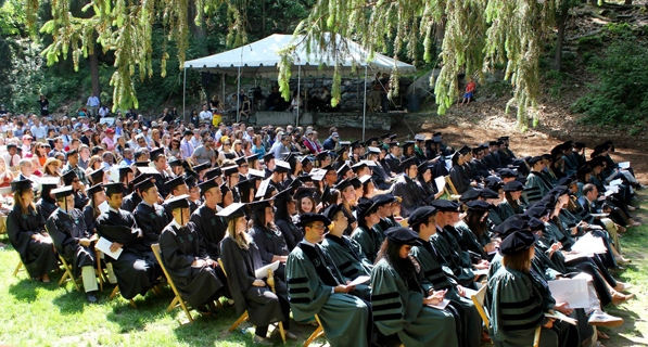 Graduate Studies students in caps and gowns