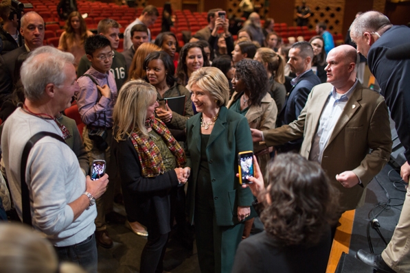 Democratic presidential candidate Hillary Clinton speaks with students