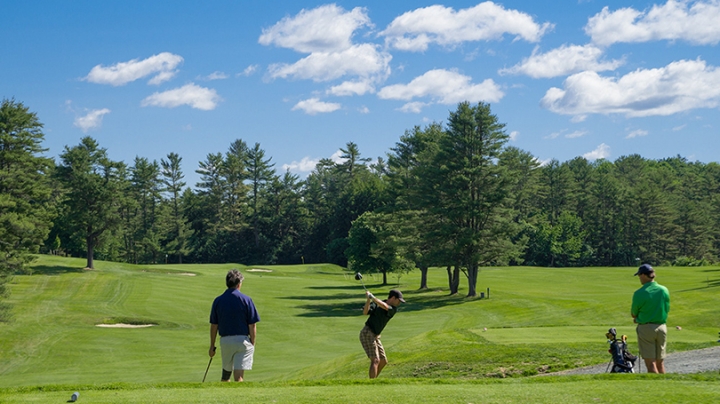 three golfers playing on the Hanover Country Club golf course