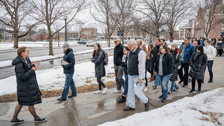 Prospective students and their families tour campus 