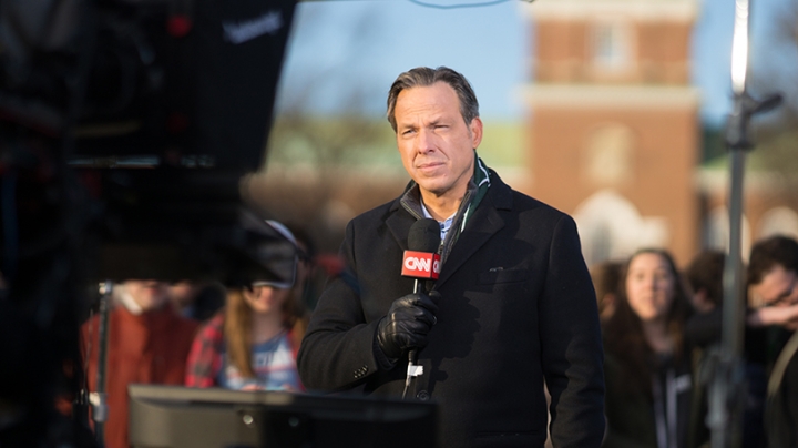 Jake Tapper reporting for CNN from the Dartmouth Green