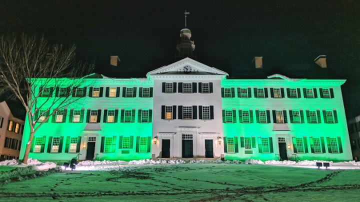 Dartmouth Hall lit green