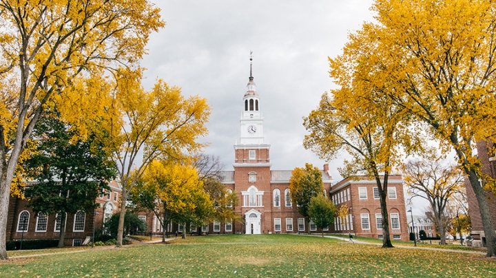 A picture of Baker-Berry Library during fall with golden maples