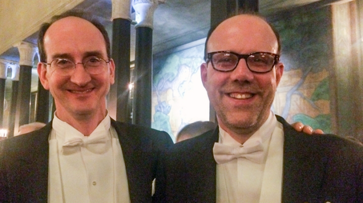  Economics professor Christopher Snyder, left, and longtime collaborator Michael Kremer, winner of the 2019 Nobel Prize for economics, celebrate after the Nobel Prize awards ceremony in Stockholm on Dec. 10. (Photo courtesy of Christopher Snyder)