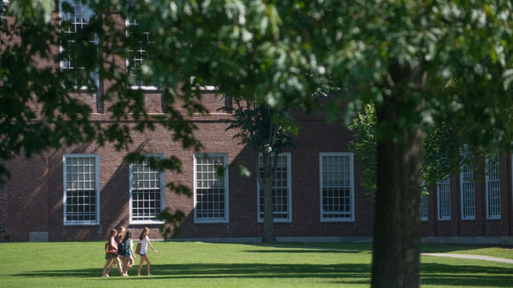 Students walking across the Green