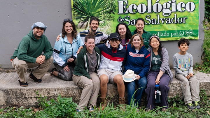 The group poses with Mayor Carmen Yulín Cruz at the community garden. In the back row, from left: Josiah Proietti, Caitlin Rosario Kelly, Sergi Elizalde, Ardell Ning '22, and Marisa Magarili '19. Front row, from left: Laure Burden '21, Angel Aguilar '22,