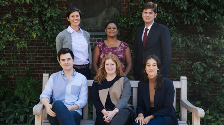 The six newest Society of Fellows postdoctoral scholars are, back row from left Elizabeth Lhost, Monica Nesbitt-Williams, James A. Godley, front row from left, Nicholas Rinehart, Whitney Barlow Robles, and Emilie Connolly. (Photos by Eli Burakian '00)