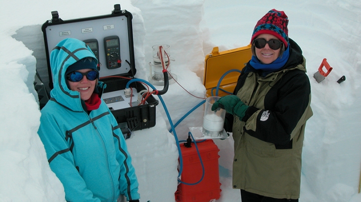Alden Adolph Professor Mary Albert measuring snow 