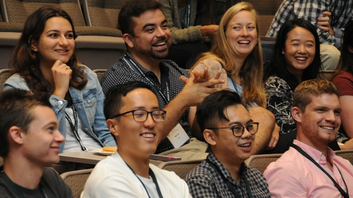 a group of students sitting in a lecture class