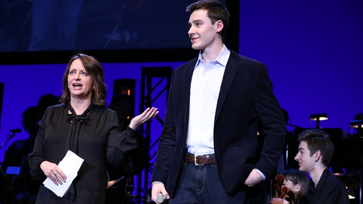 Rachel Dratch on stage with one of the Dartmouth Idol finalists