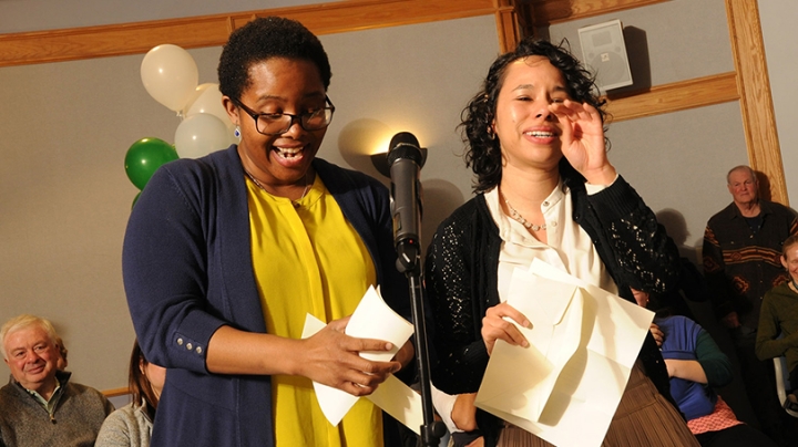 two students opening their Match Day letters together