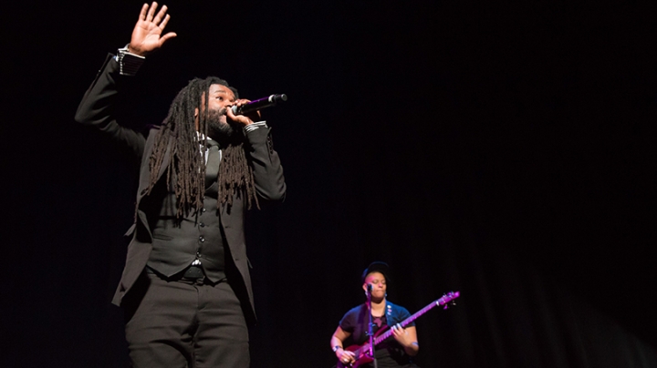 The Rev. Osagyefo Uhuru Sekou and singer-songwriter Jay-Marie Hill performing in Moore Theater 