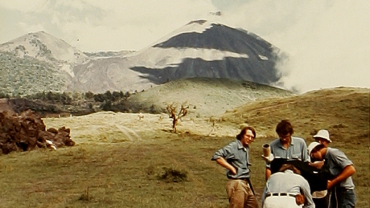 Students and Professor Richard Stoiber measure sulfur dioxide output from Pacaya